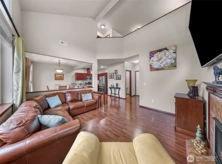 Looking from the living area into dining and kitchen this open floor plan gives so much opportunity for styling just to your needs