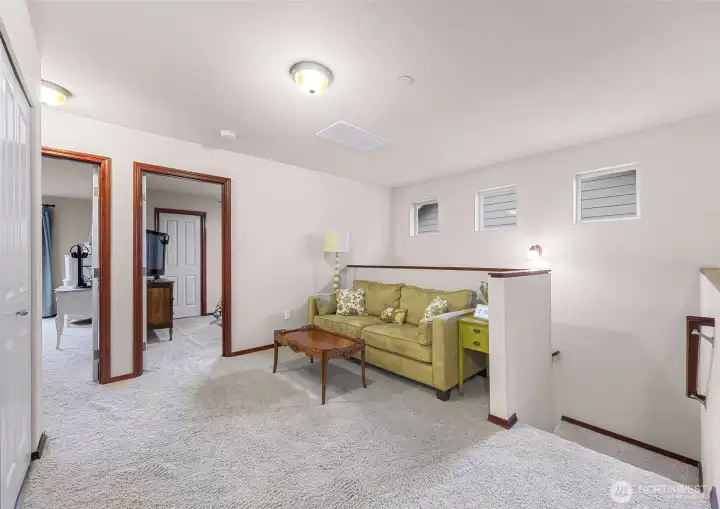 Loft area landing at the top of the stairs provides options for second living space, office, exercise space or whatever you desire!