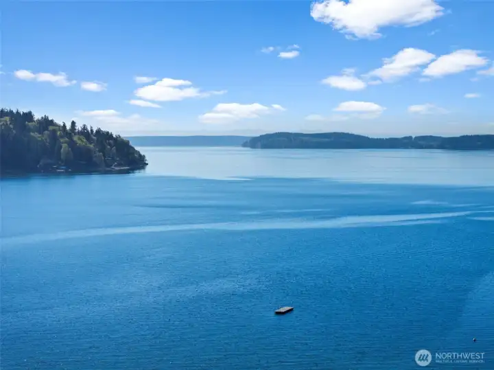 Expansive water views and scenic tree-lined surroundings. Picturesque setting with open skies and natural beauty. Expansive water views and scenic tree-lined surroundings. Picturesque setting with open skies and natural beauty.