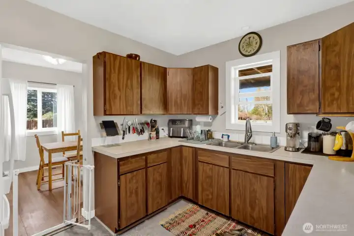 A simple, functional kitchen that gets the job done with ease. All appliances are included, making it truly move-in ready and practical for everyday living.