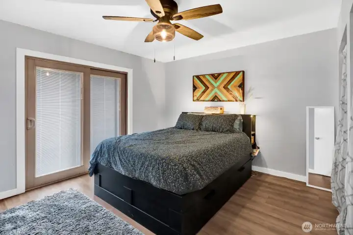 Primary bed with access to back deck