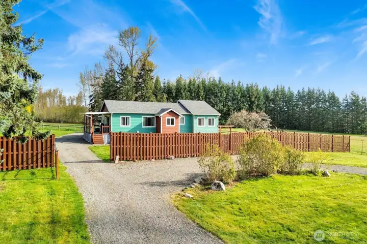 The fully fenced-in yard helps keep pets and young children safely contained, providing peace of mind while they enjoy outdoor space.
