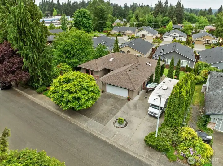 Parking galore. Large- flat- level driveway makes room for extra vehicles, RV, Boat or sports area.