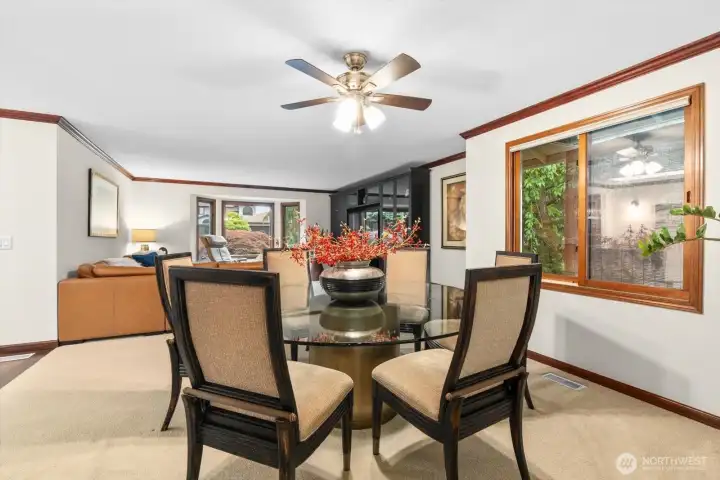 Wood wrapped windows, crown molding, ceiling fans and skylights!