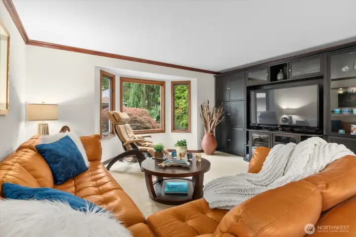 Picture windows allow plenty of natural light- great place to kick back and relax or entertain.