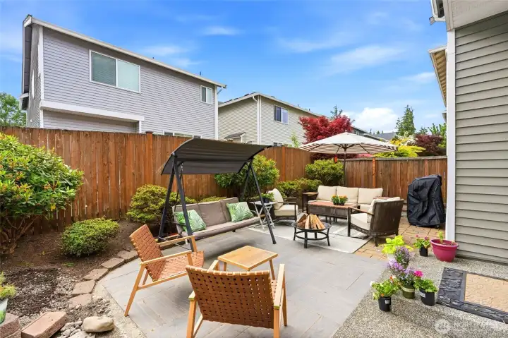 Outdoor Entertaining Area Fully fenced backyard with attractive hardscaping, mature landscaping, and multiple seating areas—perfect for summer barbecues and evening conversations. Outdoor Entertaining Area Fully fenced backyard with attractive hardscaping, mature landscaping, and multiple seating areas—perfect for summer barbecues and evening conversations.