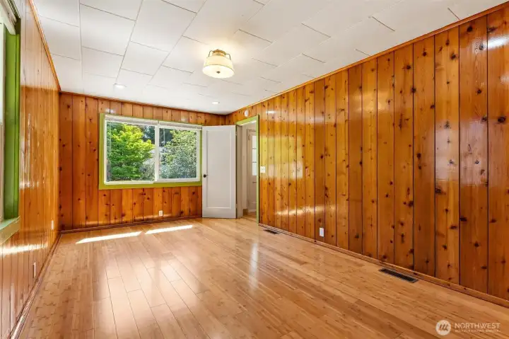 This room would make an extra large bedroom, or a second living room.