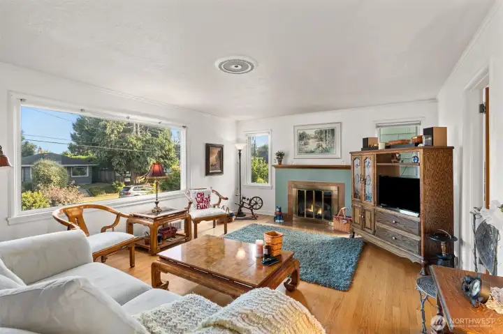 Beautiful hardwood floors, big picture window and a cozy and convenient gas fireplace to relax in front of!