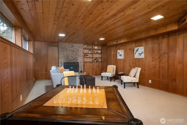 Generous sized family room an awesome place to congregate! The door to the left of the fireplace leads to the cellar.