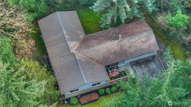 Great drone shot of the grounds and the "metal" shake roof!