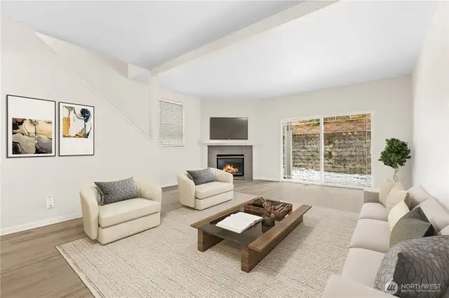 Open living area with a gas fireplace