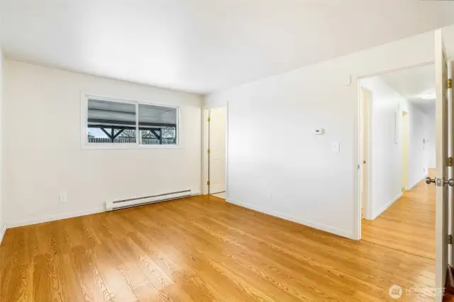 This is the primary bedroom, which faces the backyard. The bathroom is a 3/4 bath.