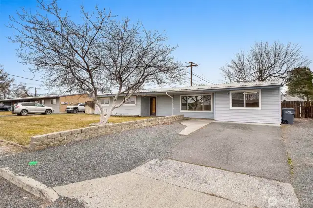 Room to park an RV to the right of the driveway.