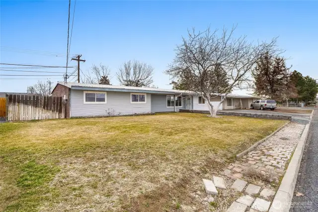 This home has a large front yard and covered front patio.