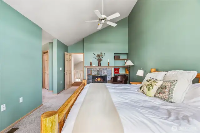 Primary bedroom with gas fireplace.