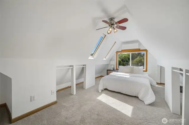 Back bedroom - could also be a primary. Across from the upstairs bathroom.