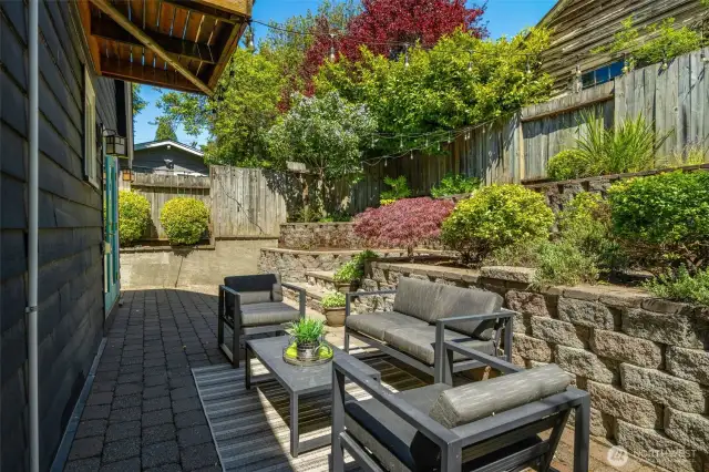 Large brick patio that was re-built- lots of levels, room to garden. Make the outside as high or low maintenance as you like!