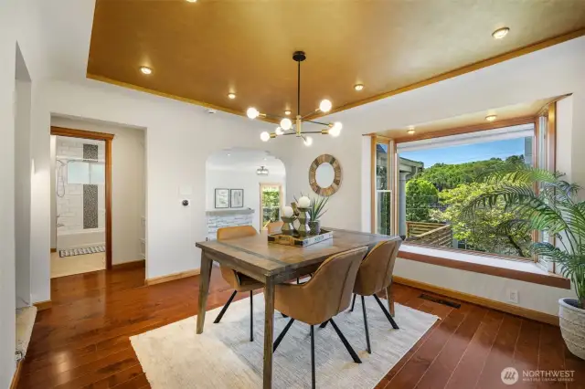 Full dining room with window bench for seating