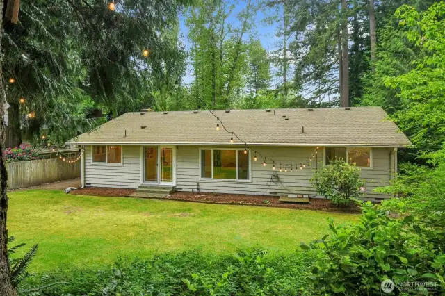 The backyard offers a blank canvas, ready to be tailored to your vision!