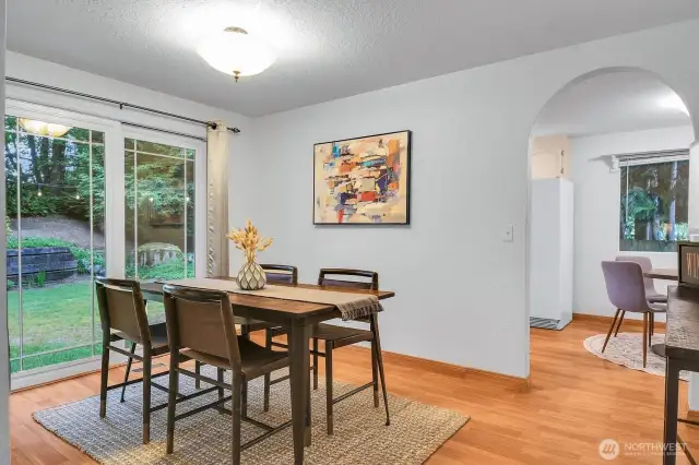Direct access to the backyard from the dining room enhances indoor-outdoor living.