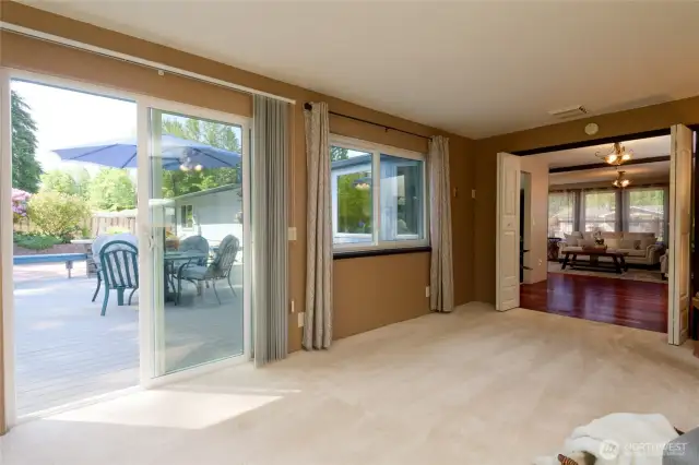 With easy access to the back deck and yard, it’s perfect for entertaining, indoor-outdoor living, or simply enjoying the fresh air just steps away.