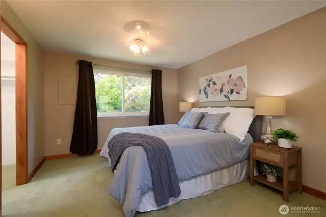 Retreat to the generous primary suite. This spacious sanctuary features a large walk-in closet with ample room for wardrobe organization, and a private en suite bath.