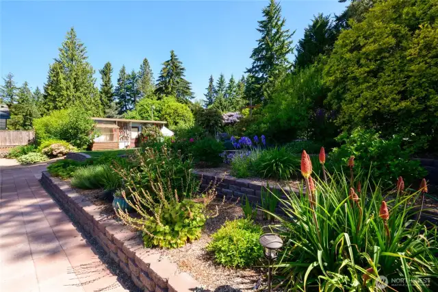 Stop to pick delicious strawberries right from your patio! The collection of curated plantings throughout the property is inspirational and beautiful.
