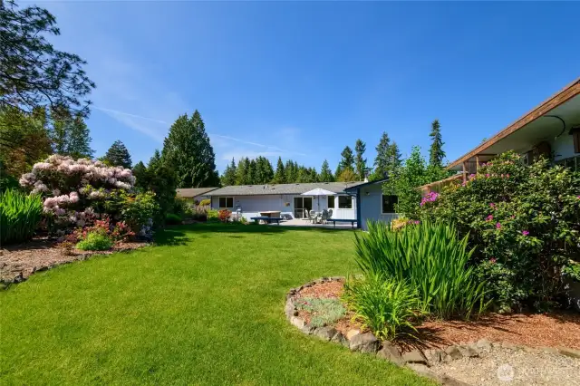 With over half an acre to explore, there's ample room for gardening, entertaining, or simply unwinding in peace. It's the perfect blend of serenity and function for those who love spending time outdoors.