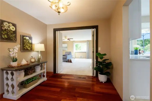 A spacious transitional area between rooms offers versatile opportunities—use it as a cozy reading nook, a stylish display gallery, or even a compact home office. It can also serve as a space for built-in storage, or a convenient coffee station to enhance both function and flow in your home.