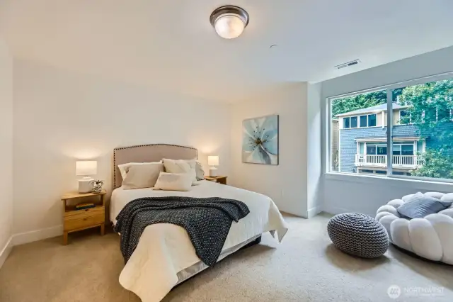 2nd primary suite on upper floor. Complete with walk-in closet and full en-suite bath.