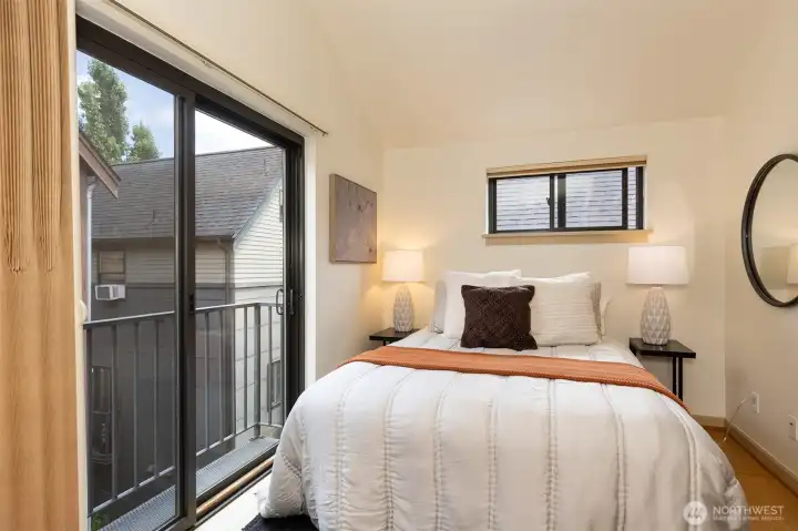Secondary bedroom with vaulted ceilings