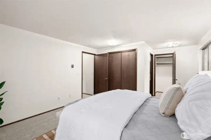 Another view of primary bedroom