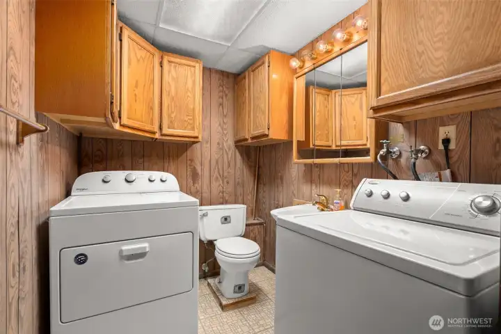 Laundry and half bathroom on lower level