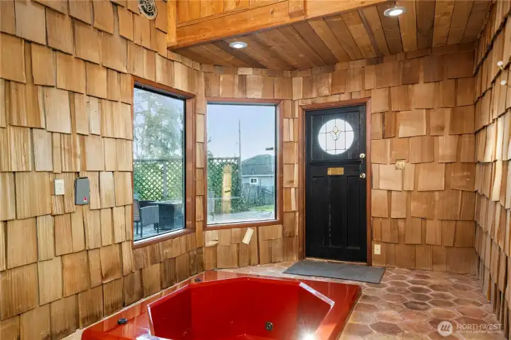 Groovy burnt orange hot tub between both units. Bring it back to life and call all your friends