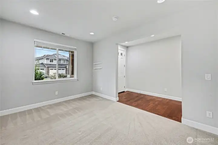 Spacious and versatile, this room is perfect as an office or hobby room, featuring a wide entrance and an abundance of natural light for a bright and inspiring space.