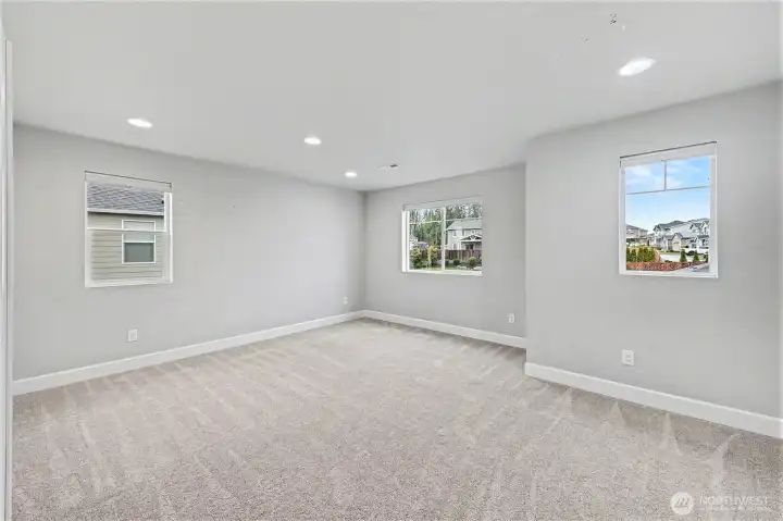 Upstairs bonus room. Whether you envision a playroom, media center, or quiet retreat, this spacious area adapts to your needs.