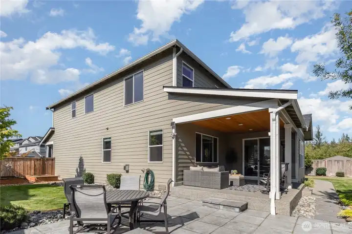 Step outside to a fully fenced backyard oasis designed for relaxation and play.