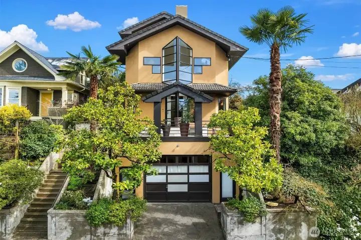 Main home with prominent front-facing gable