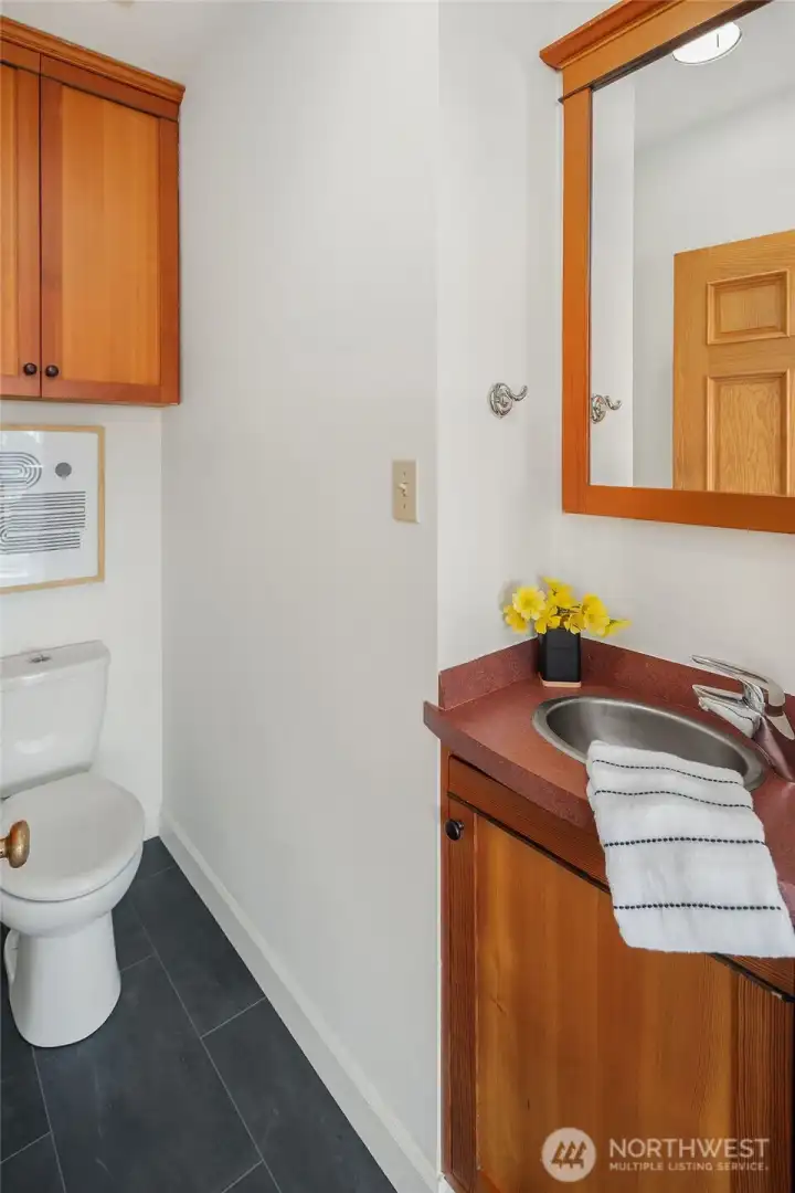 Convenient main-level powder room just off the great room