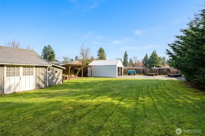 Spacious backyard w/more storage options