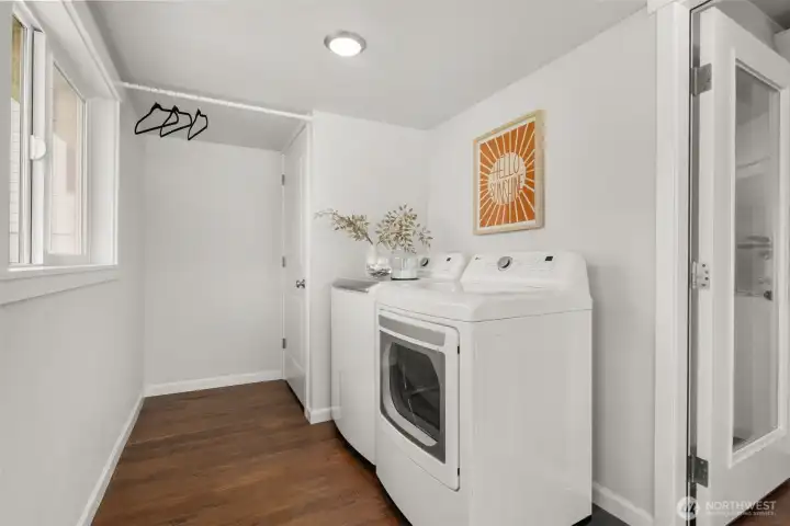 Laundry area- washer and dryer convey with home