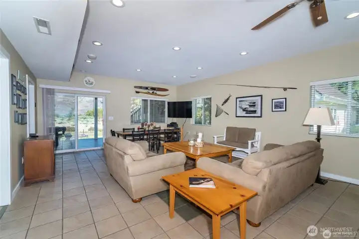 Family and dining area with a front door and back yard entries. All tile floors for low maintenance.
