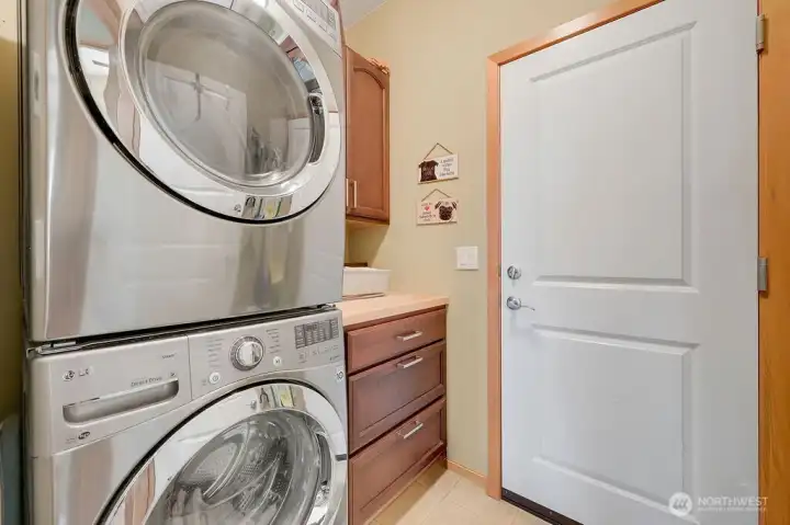 Conveniently located laundry room and garage entry