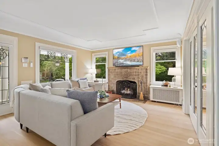 Light-filled living room with gas fireplace