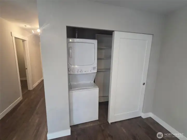 Laundry with good size storage closet.