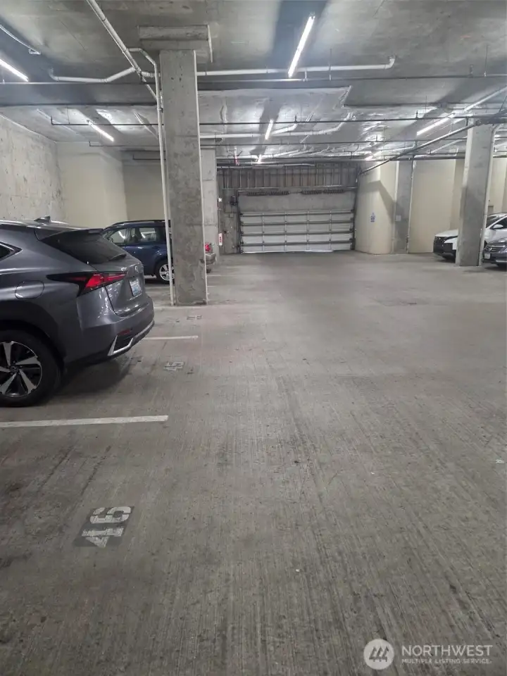 Assigned parking spot with secure garage door.