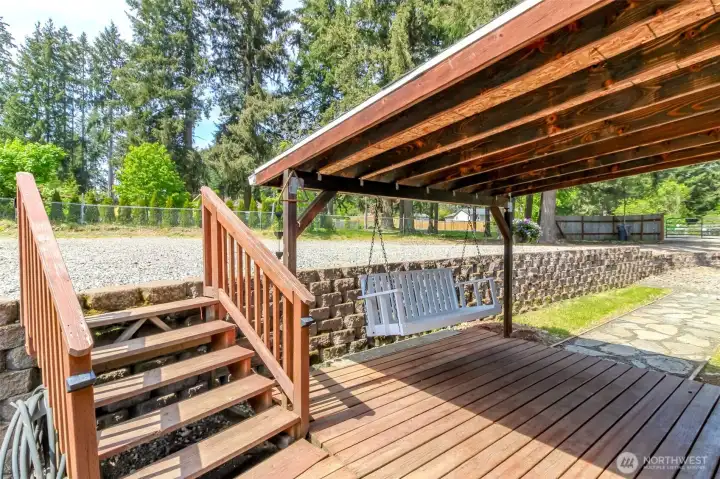 Nice covered front porch with swing