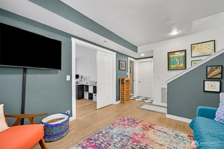 Family room with French doors into office / flex room