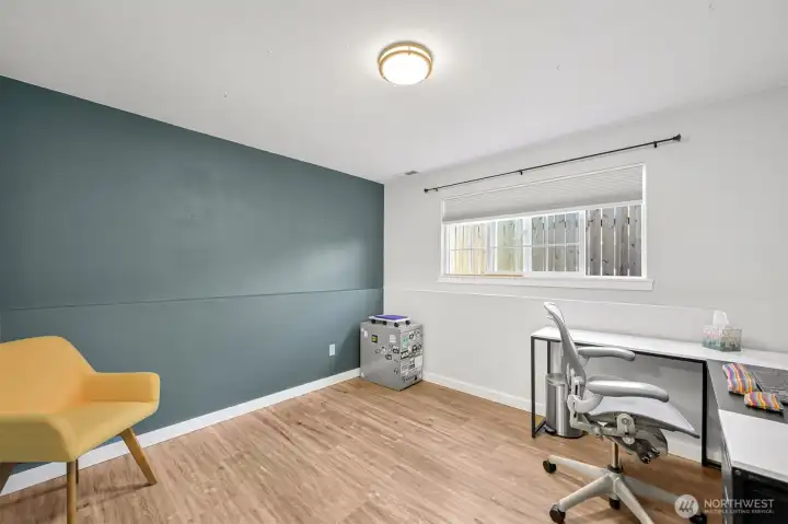 Office / flex room. There is a 3/4 bathroom on this level, so this could be a 4th bedroom with the addition of a closet.