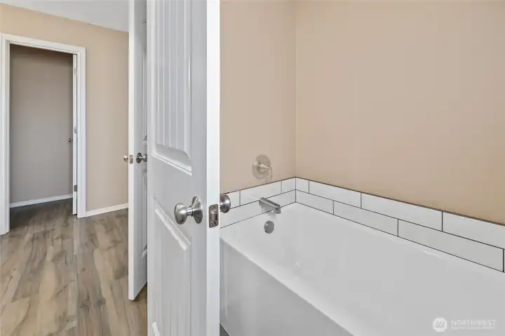 Primary Suite with attached full bath & walk-in closet